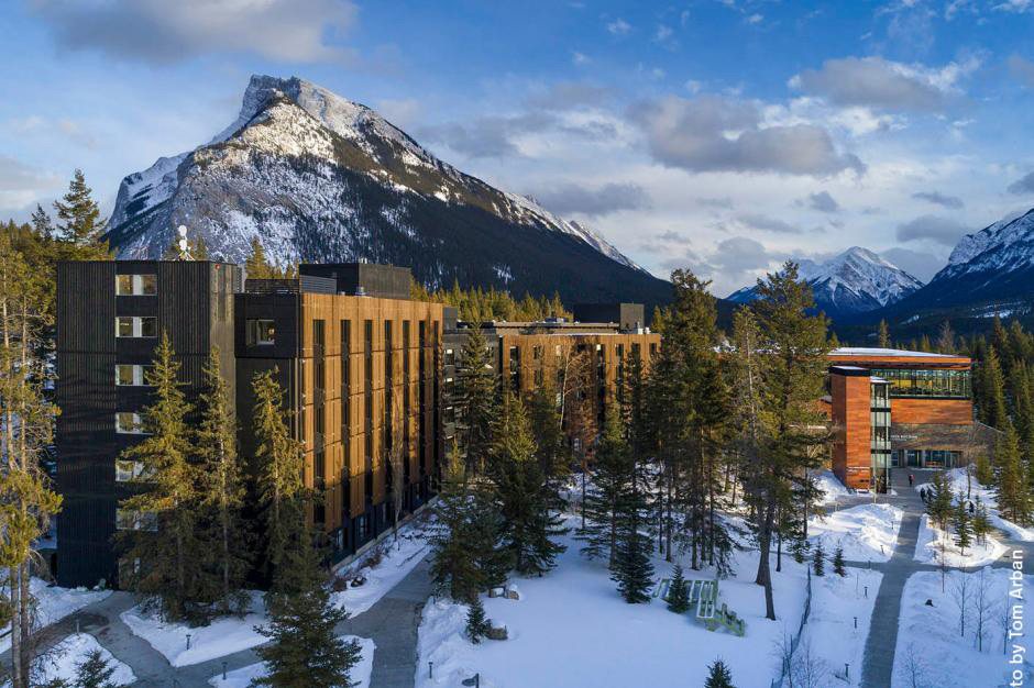 Lloyd Hall, a residence building at Banff Centre, with Mount Rundle behind it